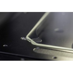 Clear, glass-hard hybrid glass protects a measuring device from scratches on the object glass